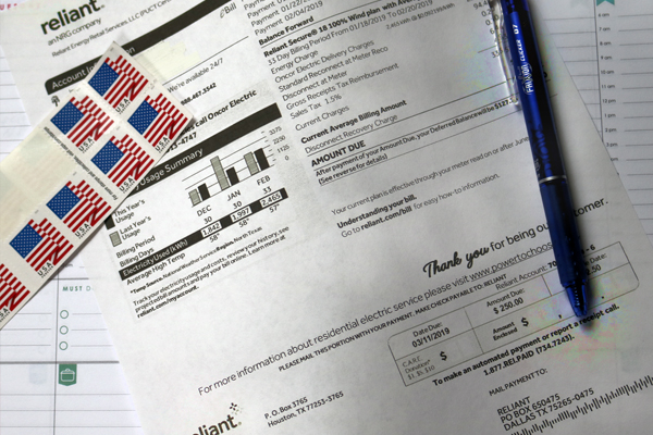 image of a bill and stamps