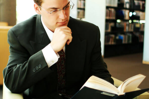 man reading book