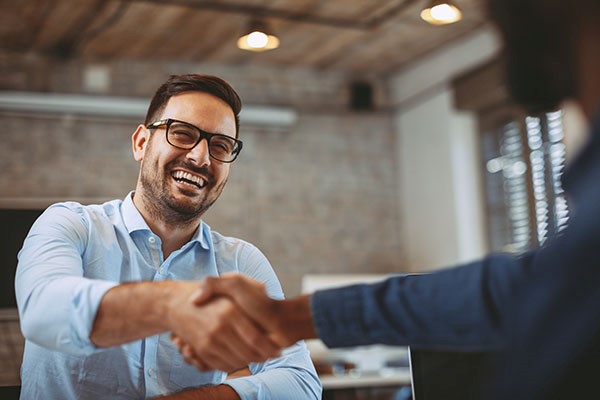 two people shaking hands