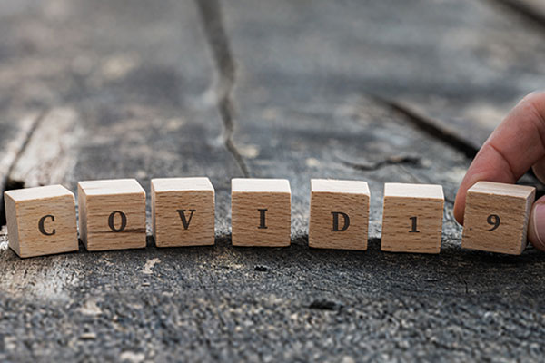 letter blocks spelling out COVID19