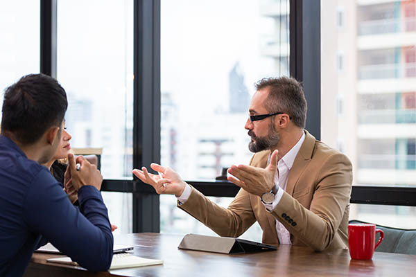 two people talking
