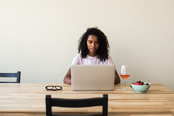person sitting at laptop working